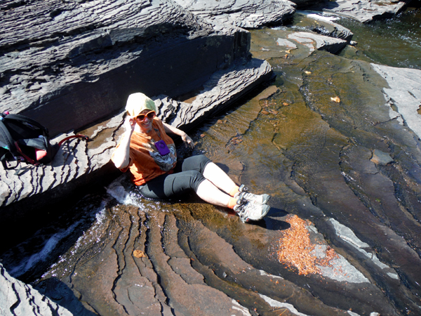 Karen Duquette cooling off in the waters of Manido Falls